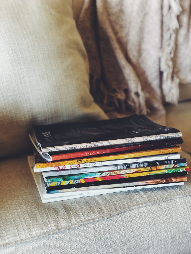 stack of paola lane magazine on couch